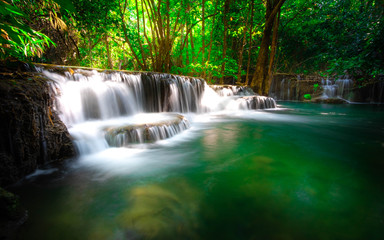 Huai Mae Khamin Waterfall, Kanchanaburi It is a beautiful waterfall in Thailand. And people go on vacation. Or take family to create activities together.