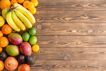 Colorful border of assorted fresh tropical fruit