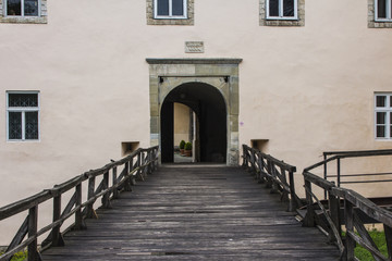 Fototapeta na wymiar Wooden bridge leading to the entrance to the Uzhhorod castle. Ukraine
