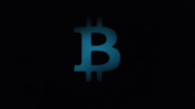 Abstract animation of bitcoin currency sign. Bitcoin sign building from light conducting.