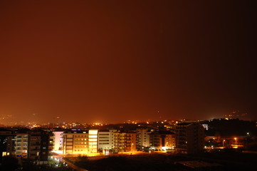 the sky after a thunderstorm over the night city. Alanya, Turkey.