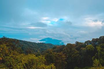 high mountains peaks range clouds in fog scenery landscape national park view outdoor  at Chiang Rai, Chiang Mai Province, Thailand