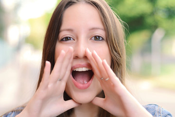 Young woman shouting and screaming.