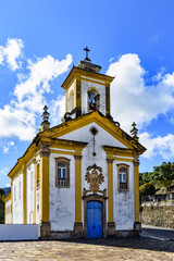 Front view of ancient catholic church of the 18th century located in the center of the famous and historical city of Ouro Preto in Minas Gerais