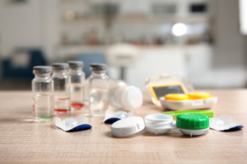 Contact lens case and accessories on table