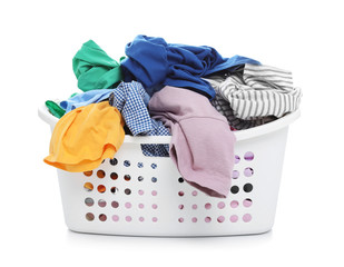 Laundry basket with dirty clothes on white background