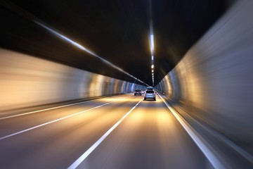 Driving in a tunnel - obrazy, fototapety, plakaty