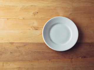 Empty Plate on wooden background