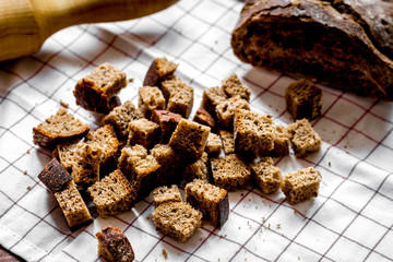 Baking bread ingredients on wooden table background