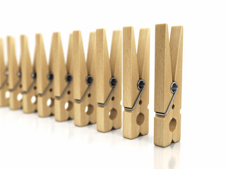 Wooden clothespins. Image with clipping path