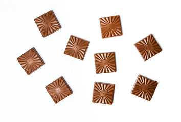Chocolate pieces isolated on white background