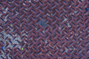Urban diamond plate closeup texture background.
