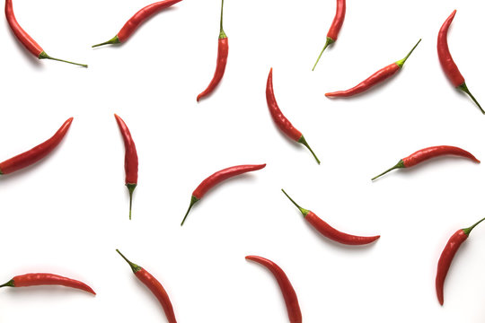 Red hot little chili peppers pattern isolated on white background. Top view. Flat lay.
