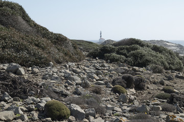 Lighthouse on the slate cape of Favaritx, Menorca, Balearic Islands, Spain