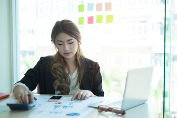 secretary asian woman working in modern office.
