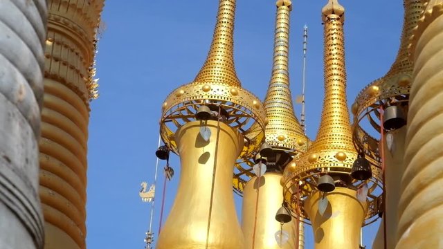 The hti ornamental umbrellas are traditional architectural detail of Burmese stupas, Inn Thein Buddha image Shrine in Indein (Inn Thein) village, Inle Lake, Myanmar.