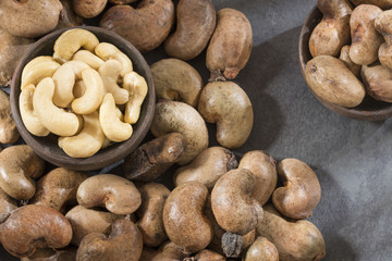 Cashew nut on wooden background - Anacardium occidentale