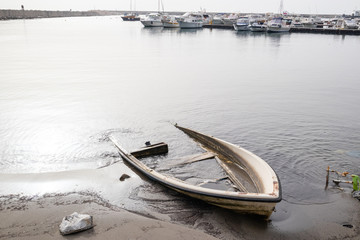 sinking boat in the harbor of the Campi Flegrei (Phlegraean Fields)