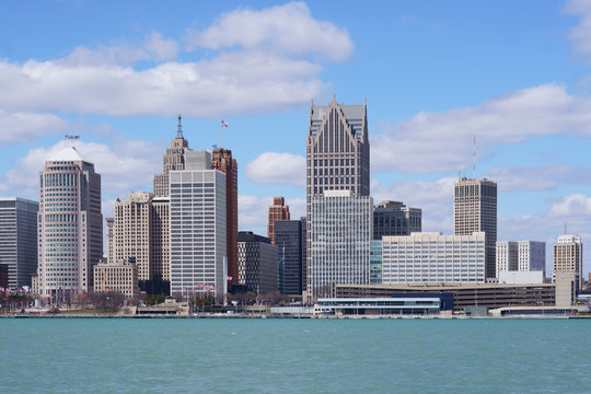 Detroit city center during a beautiful day view from Windsor, Ontario, Canada.