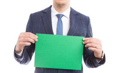 Close-up of businessman holding empty paper.