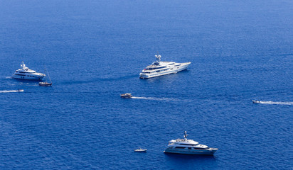 Blue sea and leisure boats seen from  from Augustus Gardens,Isle of Capri, Italy