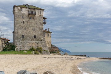 Fototapeta na wymiar Medieval tower in Ouranopoli, Athos, Chalkidiki, Central Macedonia, Greece 