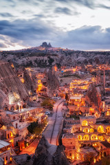 night view of Goreme and Uchisar on horizon, Cappadocia, Turkey. A world-famous tourist center of balloon flight