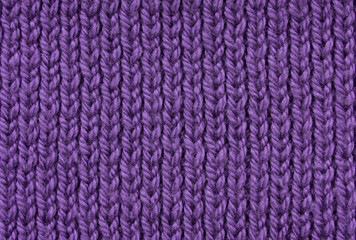 Fototapeta premium Ultraviolet texture of knitted handmade. Closeup. Wallpaper or abstract background. Pattern.