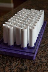 Lip balm tubes in formation