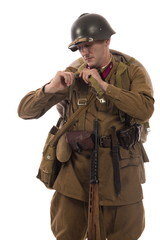 Male actor in the form of an ordinary soldier infantryman of the Russian army during the Second...