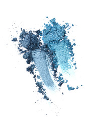 Smear of crushed shiny blue eyeshadow as sample of cosmetic product