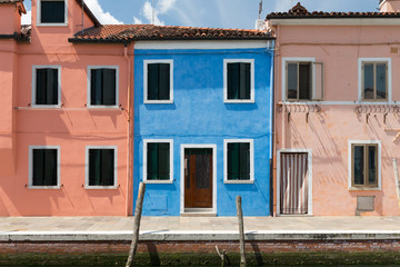 Colorful houses of Burano island / small village near the Venice