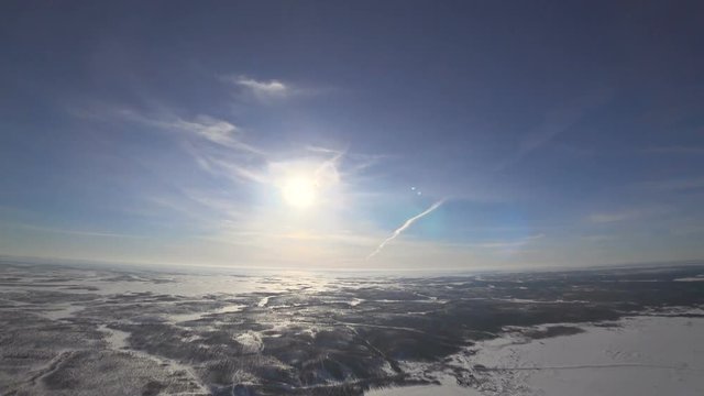 Peaceful landscape with parachuters