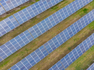Aerial view industrial Photovoltaic solar units panels environment producing renewable green energy
