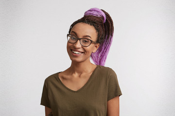 Is that for me? Portrait of dark-skinned young female feels happy and glad for prize from her...