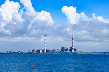 View from sea to industrial landscape of Kamarajar port, India