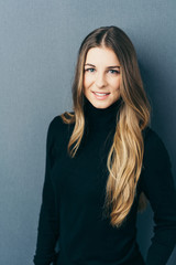 Fototapeta premium Attractive young woman with long brown hair