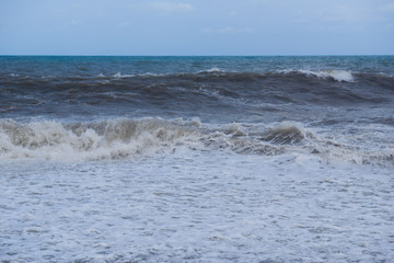 Stormy sea waves breaking near the coast