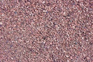 Brown, red and purple stones background 