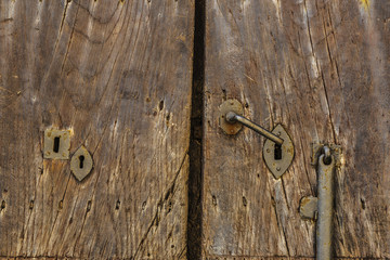 Old wooden door in Erice, Sicily, Italy
