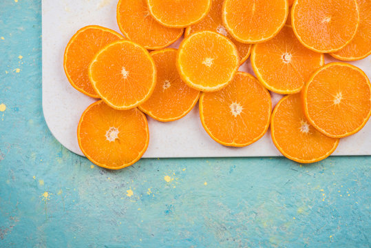 Vibrant Orange Slices On Board