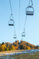 Closed ski lift on the mountain at autumn. Ski center in autumn