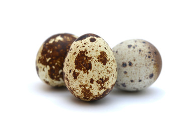 Food: group of quail eggs, isolated on white background