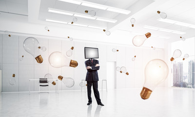 Businessman with TV instead of head.