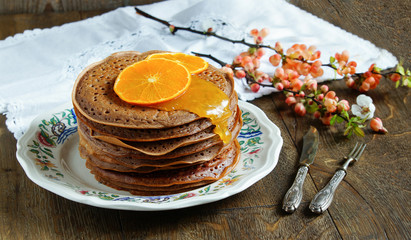chocolate pancakes with orange cream