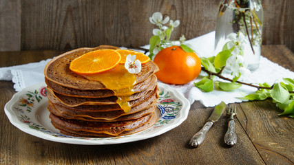 chocolate pancakes with orange cream