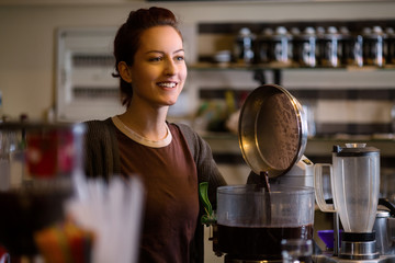 Young cafe manager working