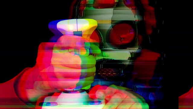 a freaky gasmask woman using a retro computer arcade game joystick