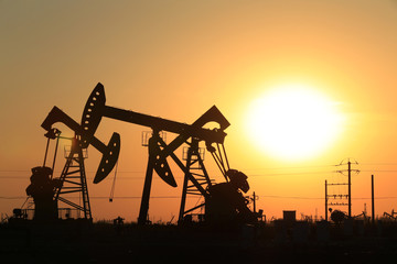 The pumping unit is working in the setting sun