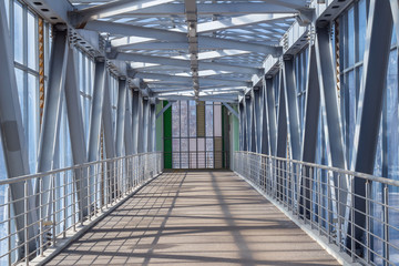 Elevated pedestrian crossing over the street